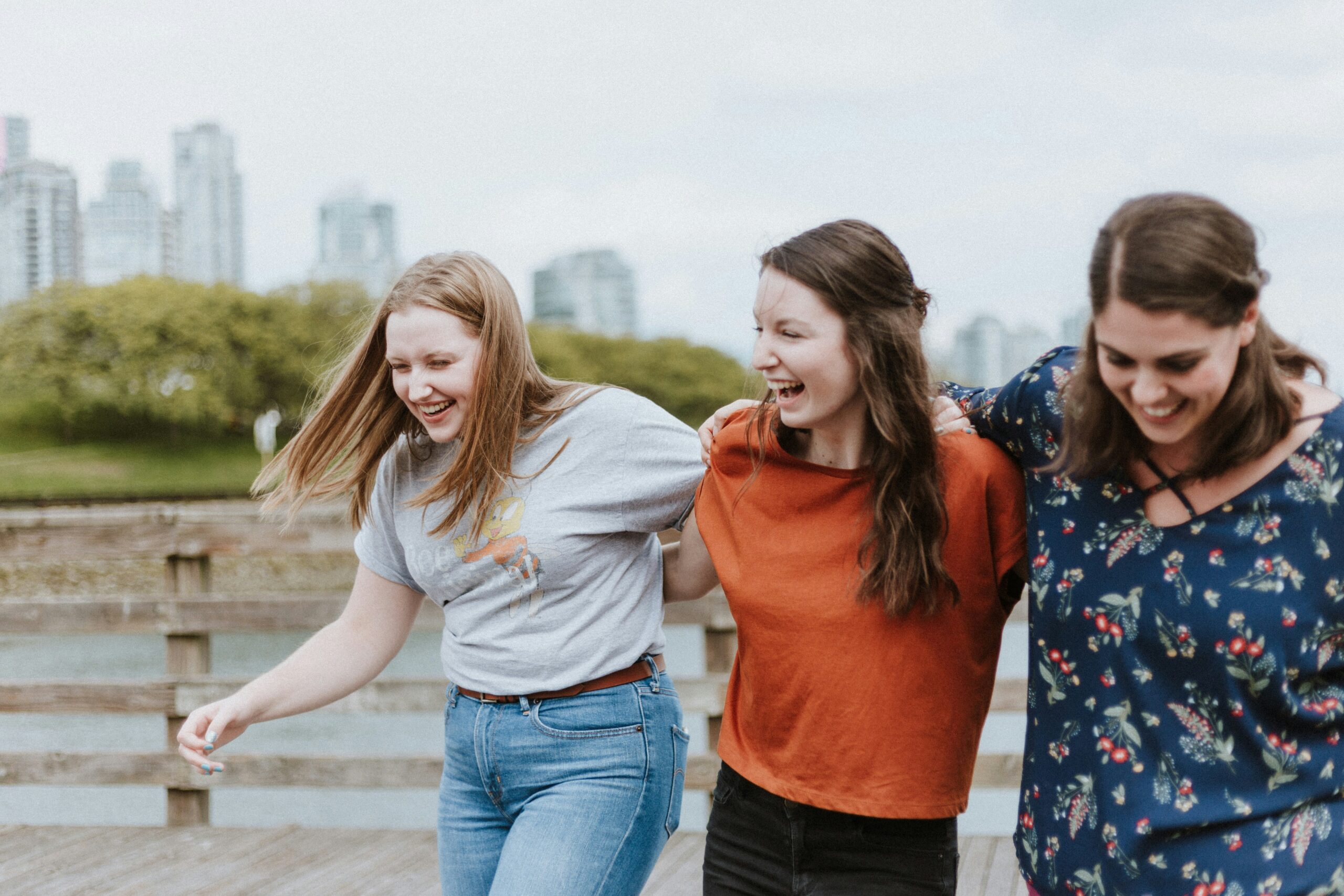 a group of girls are having a great time together
