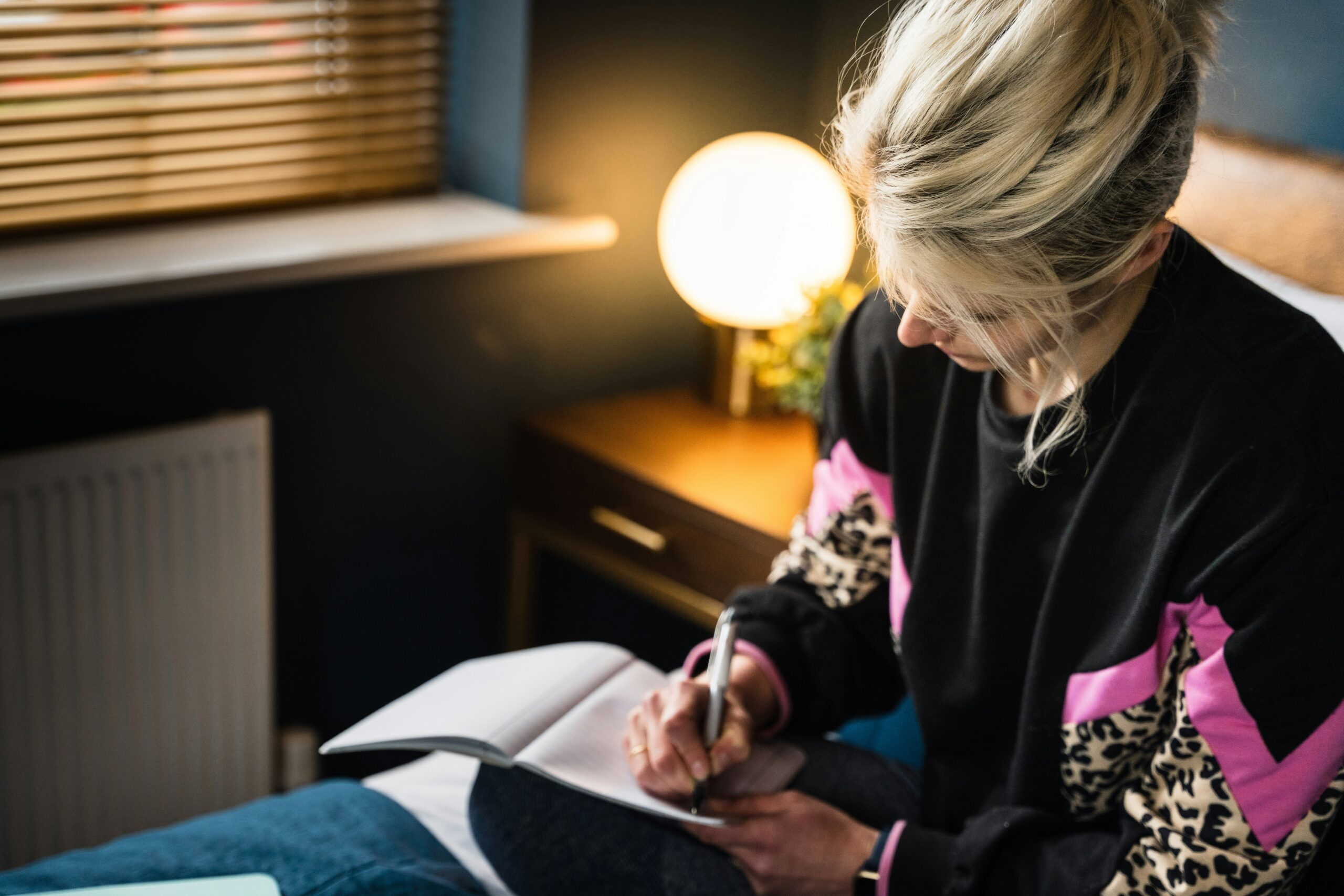 a girl is journaling